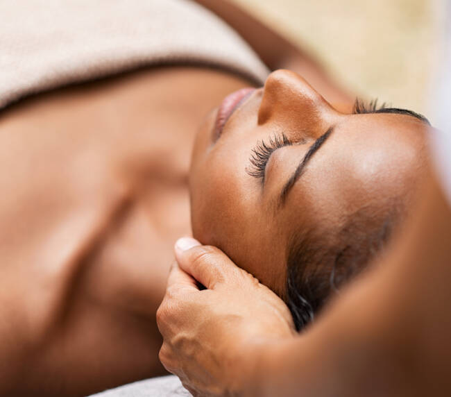 Registered Massage Therapist providing therapeutic massage therapy in Lethbridge to relieve muscle tension