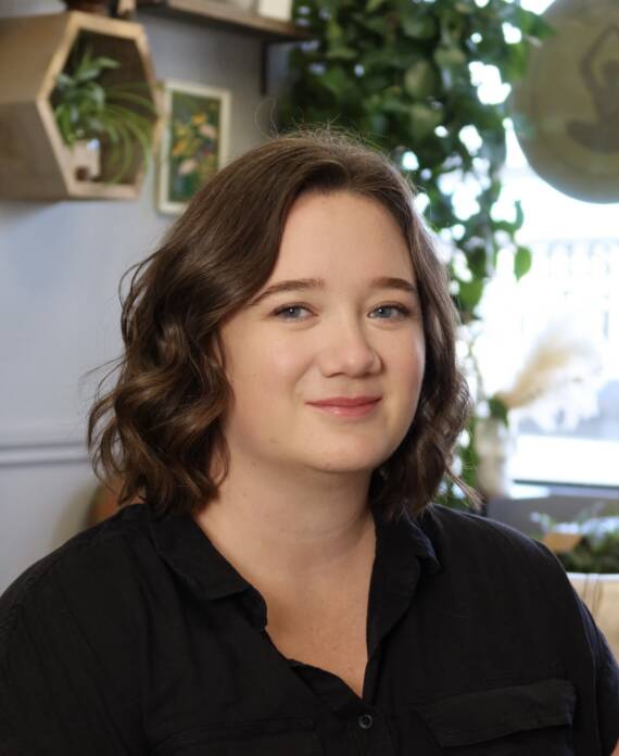 Saya Orimolade, Registered Massage Therapist and Facial Therapist at Rowan & Peridot Collective in Lethbridge