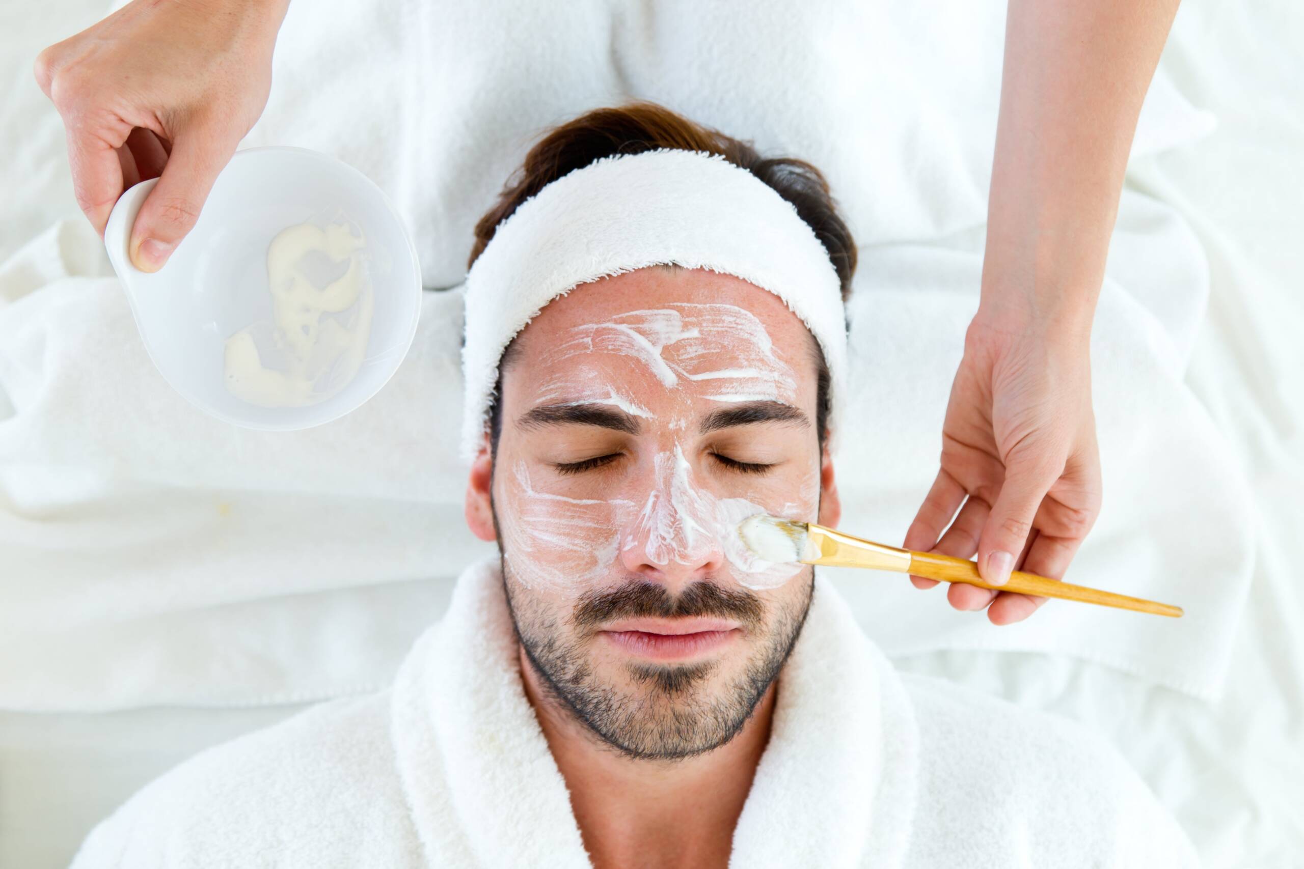 Professional facial treatment being performed at Rowan & Peridot Collective in Lethbridge