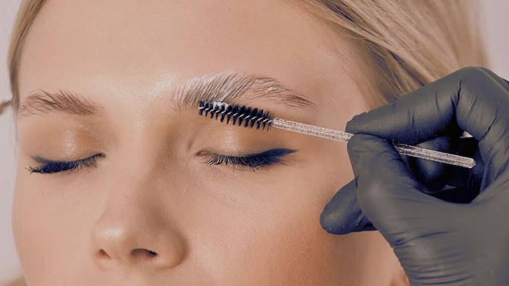 Brow lamination without tint showing natural fuller brows with lifted shape