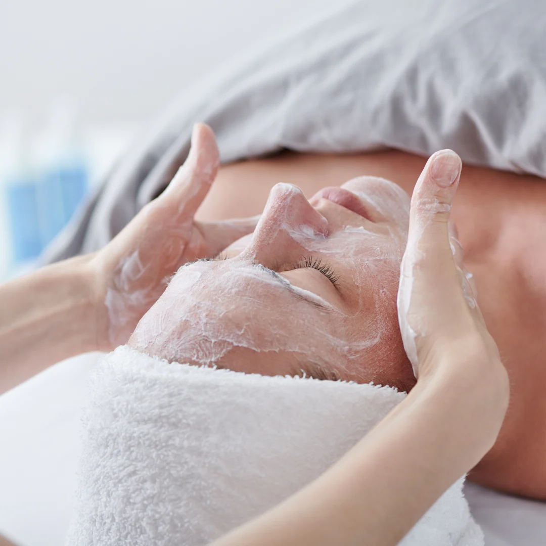 Client enjoying a relaxing facial treatment designed to nourish the skin