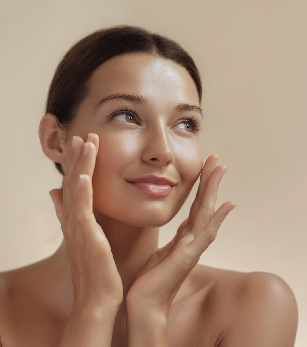 Esthetician discussing waxing areas with client before treatment