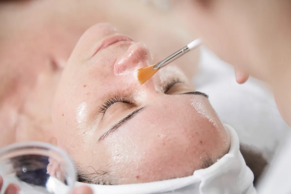 Deep cleansing facial treatment with steam during a Deluxe Facial
