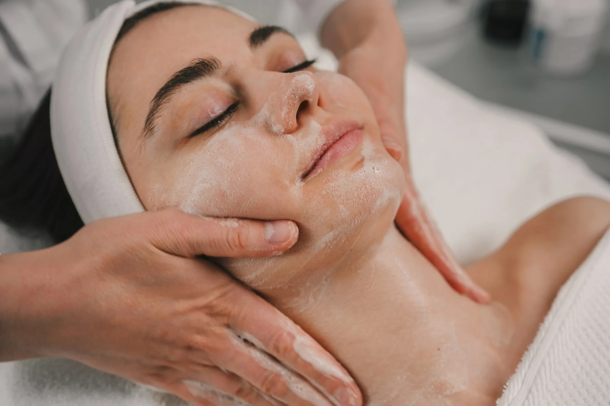 Nourishing facial mask applied during Deluxe Facial