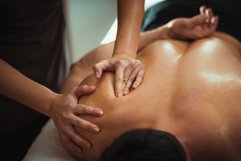 massage therapy in Lethbridge with therapist performing full body massage treatment