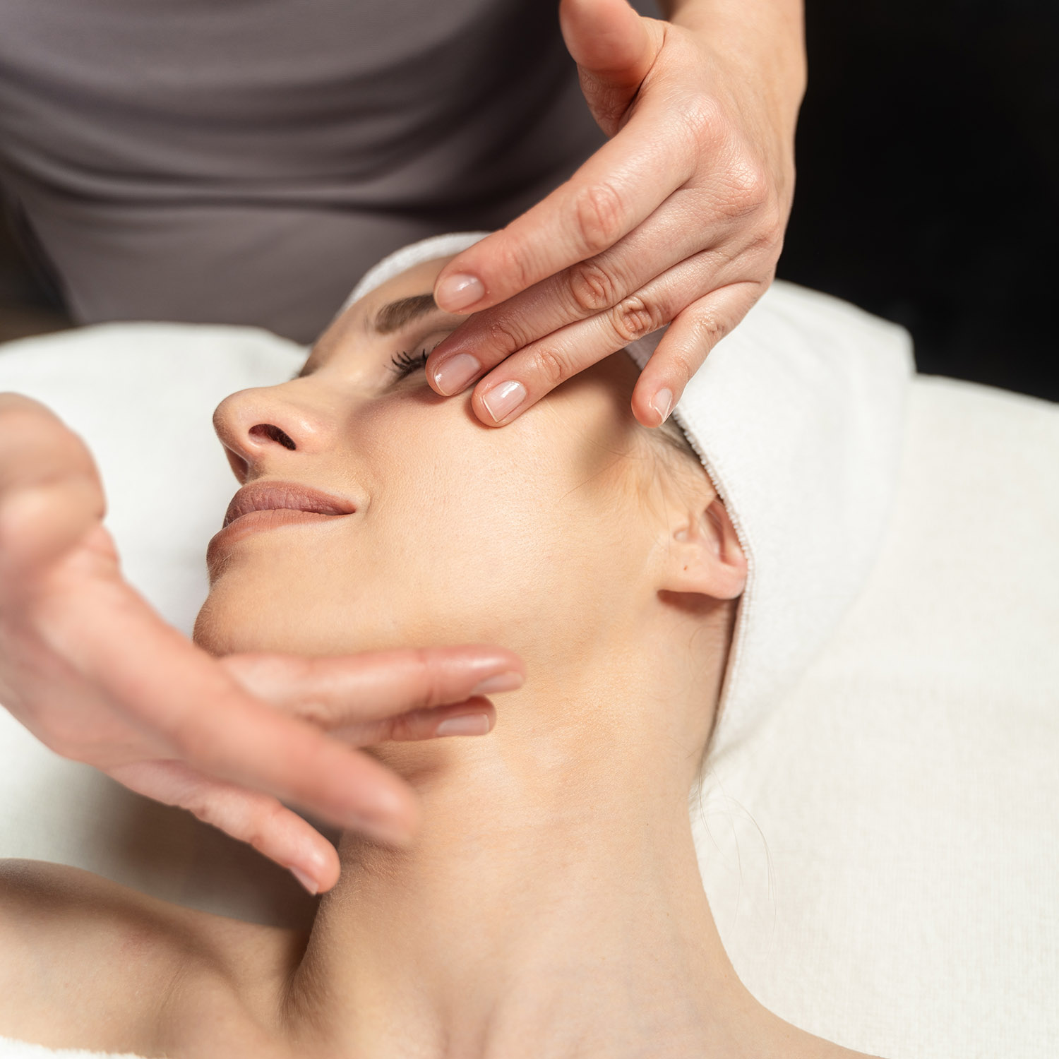 Client relaxing during Prestige Facial treatment in Lethbridge