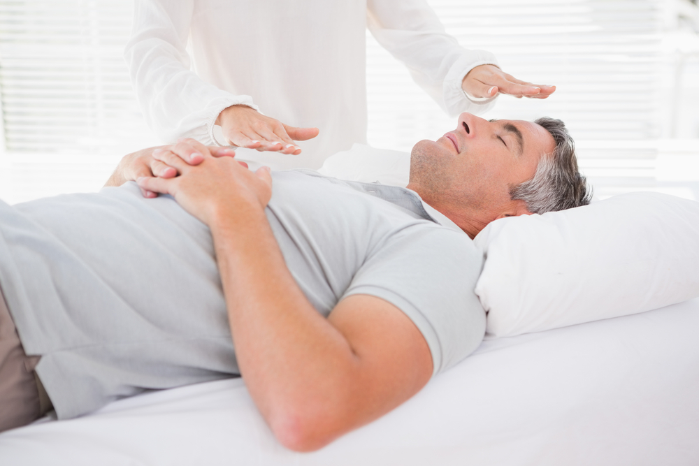 Peaceful treatment room prepared for a Reiki session