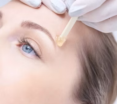 Eyebrow waxing treatment shaping and defining natural brows