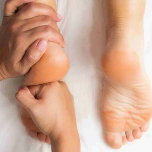 Therapist guiding client’s arm movement during RAPID NFR session for fascia release