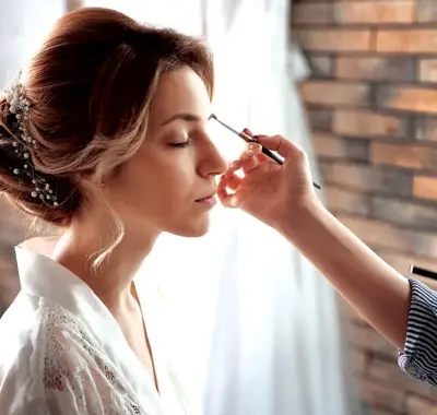 Wedding makeup application for a bride at Rowan & Peridot Collective in Lethbridge